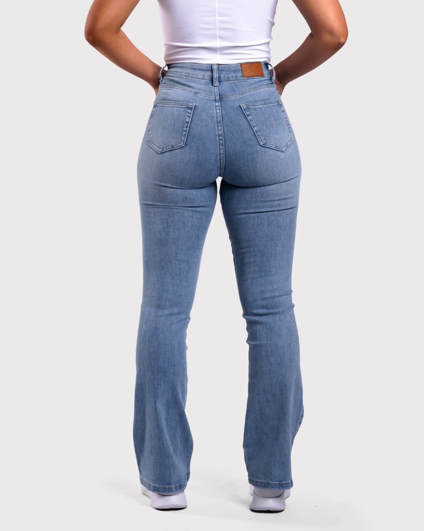 Light Blue Flared Jeans - Peach Tights -