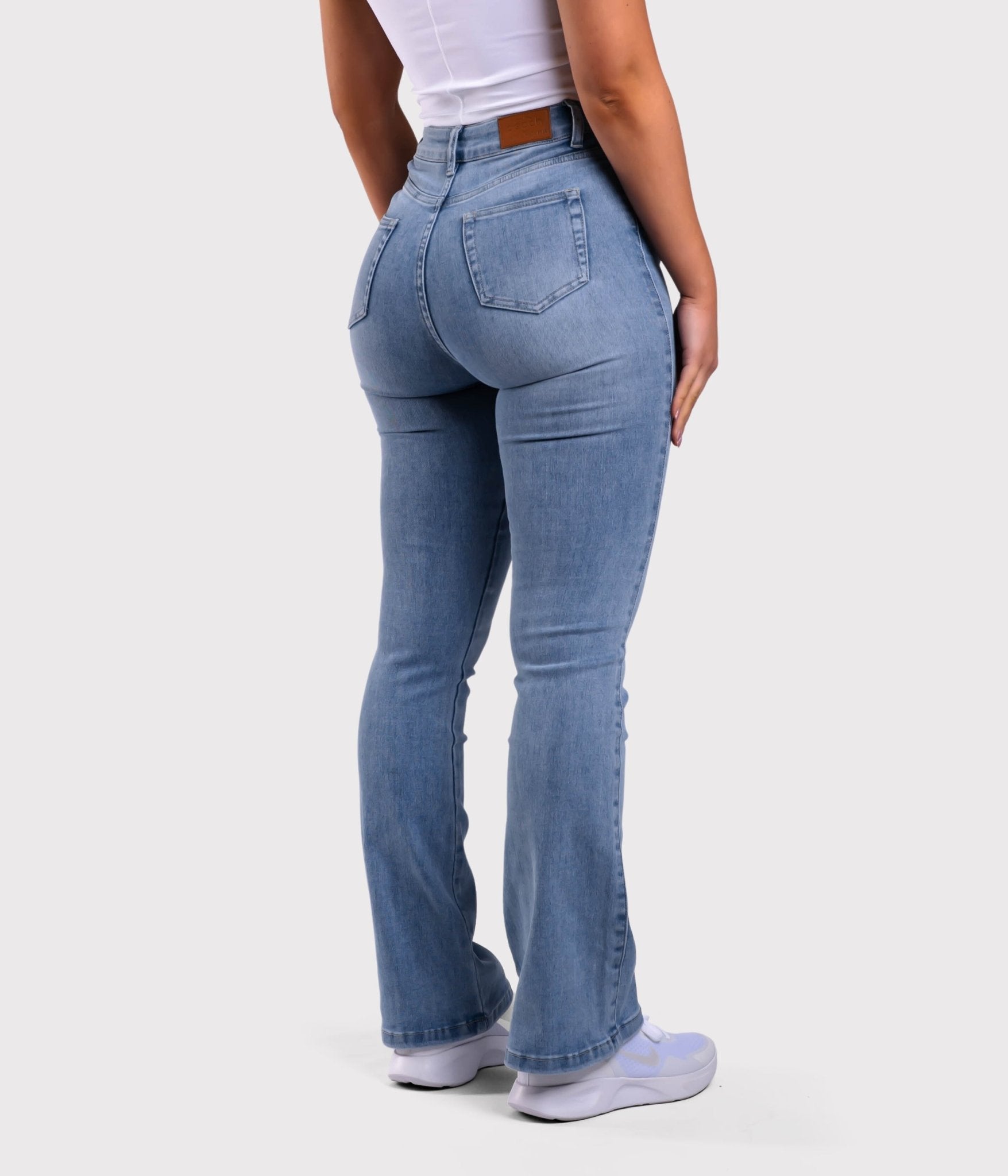 Light Blue Flared Jeans - Peach Tights -